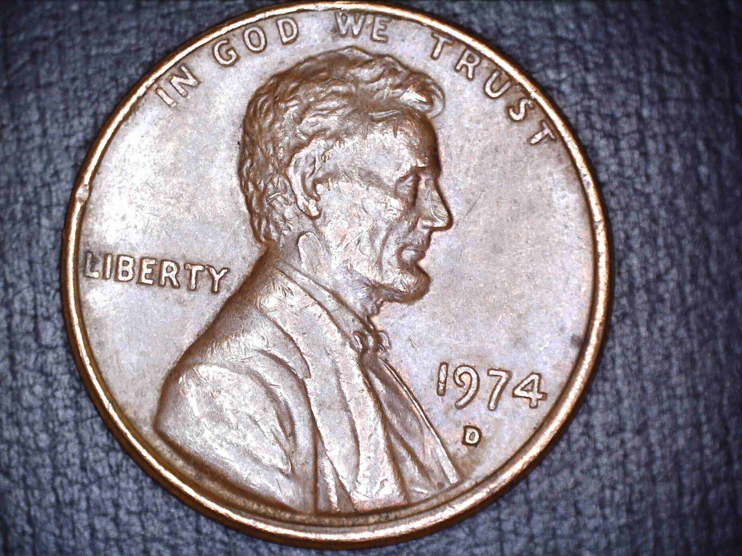 1974-D-Penny-....issues-On-Neck-And-Cheekbone.